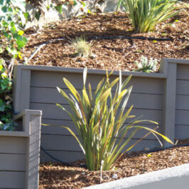 Composite retaining wall timbers